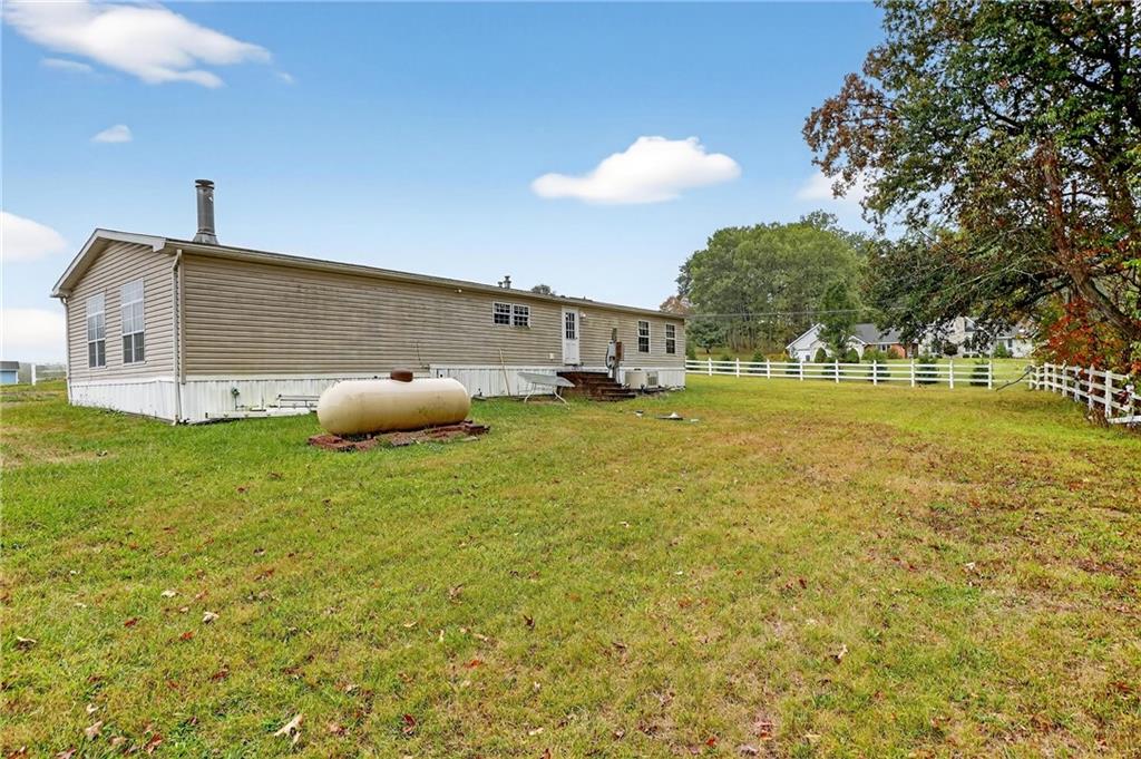 332 Overbrook Road Valencia, PA 16059 - Photo 49 of 50 a view of a lake with table and chairs