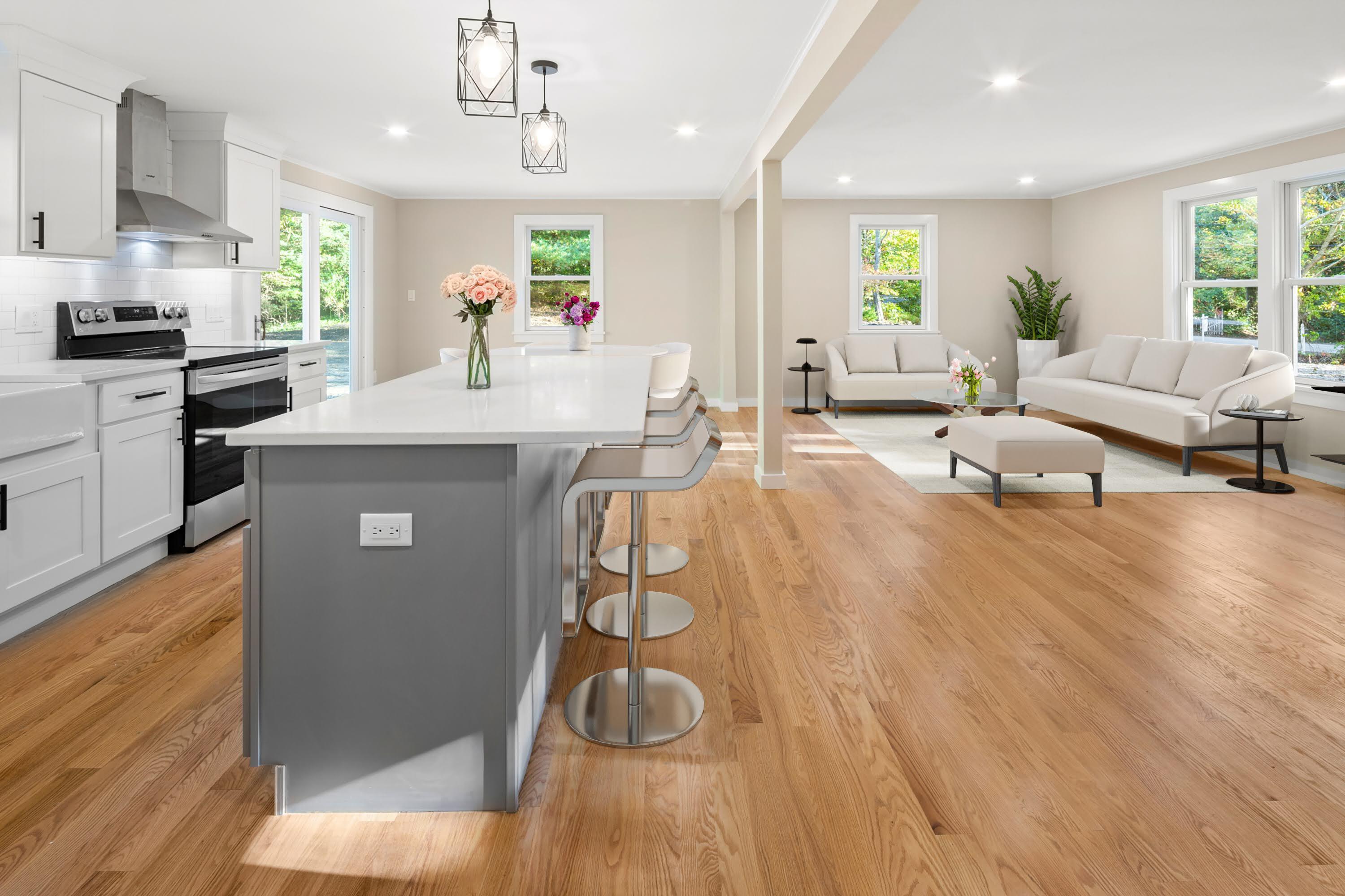 145 Stony Brook Road Brewster, MA 02631 - Photo 11 of 42 a large kitchen with cabinets a sink a counter space and stainless steel appliances