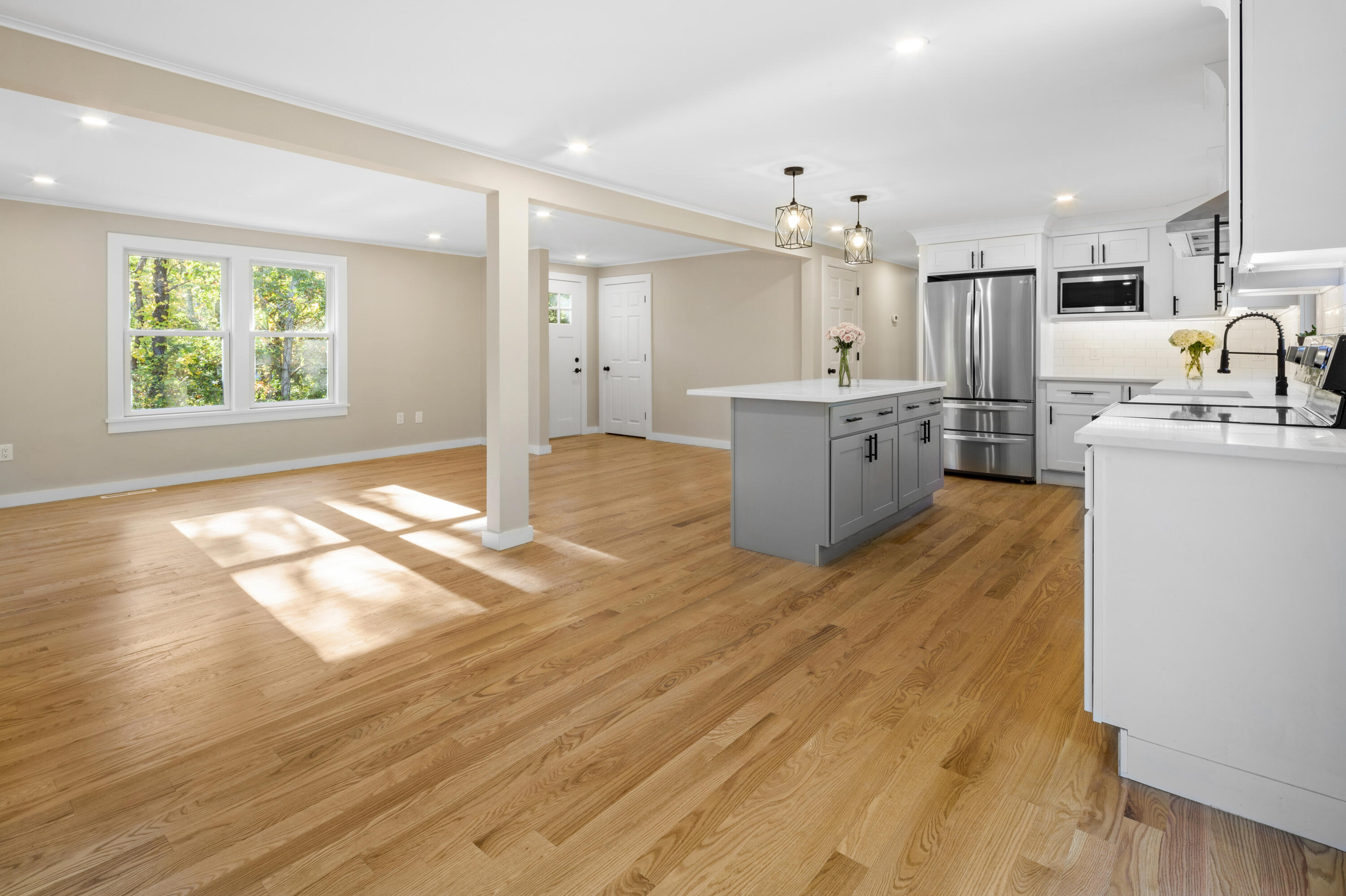 145 Stony Brook Road Brewster, MA 02631 - Photo 18 of 42 a large kitchen with lots of counter top space and stainless steel appliances