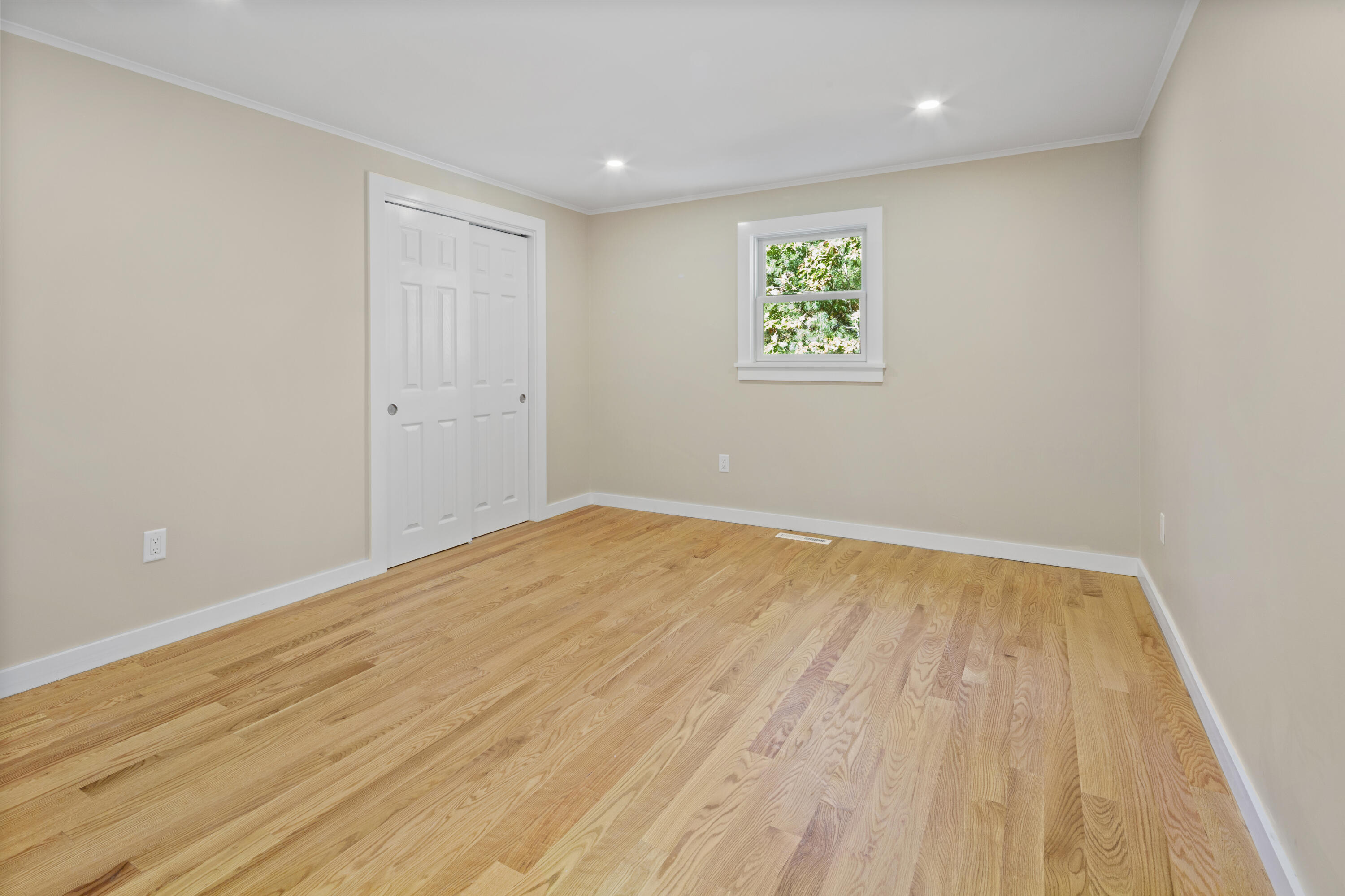 145 Stony Brook Road Brewster, MA 02631 - Photo 36 of 42 a view of empty room with wooden floor