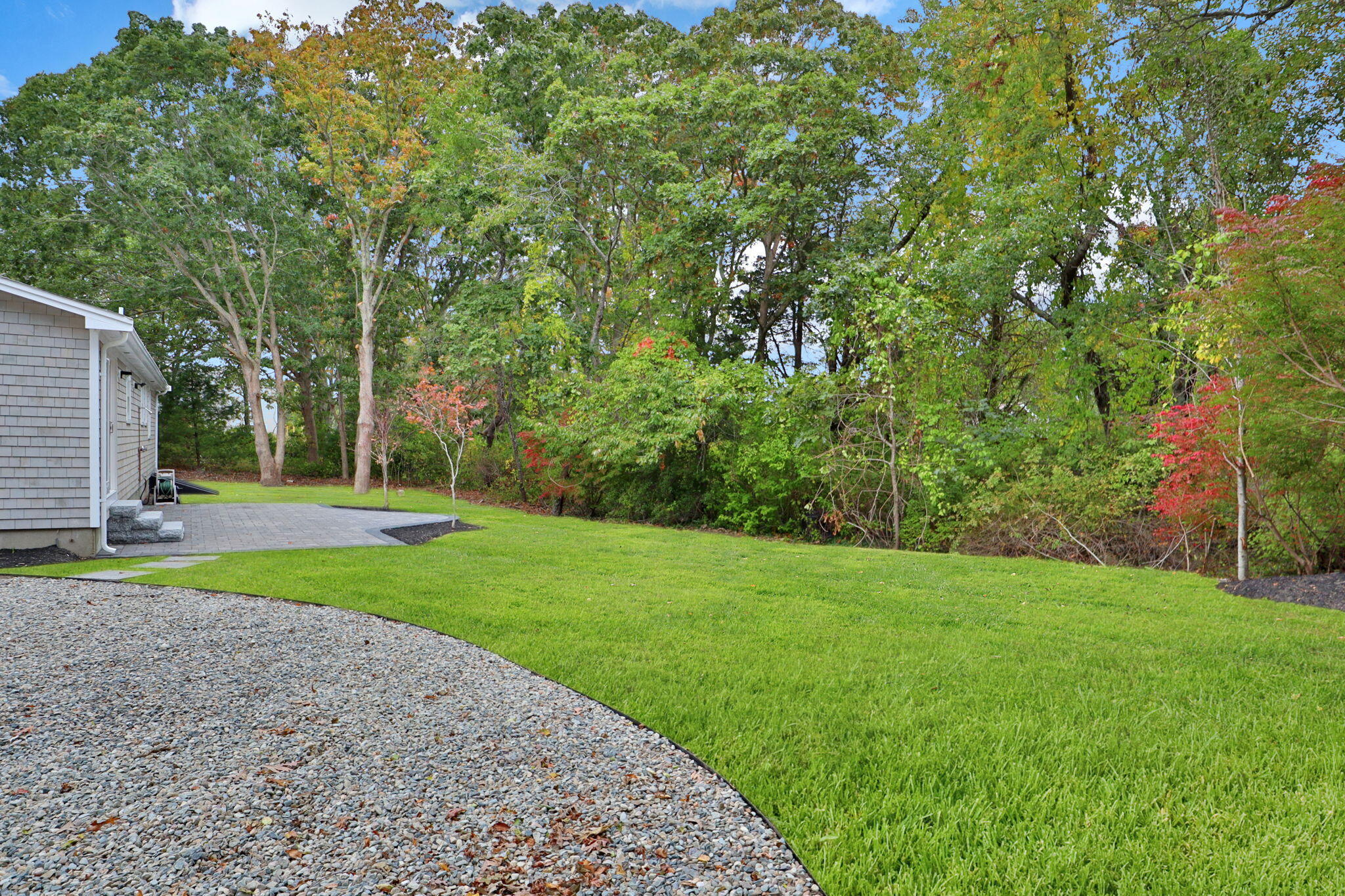 145 Stony Brook Road Brewster, MA 02631 - Photo 7 of 42 a view of a park with large trees