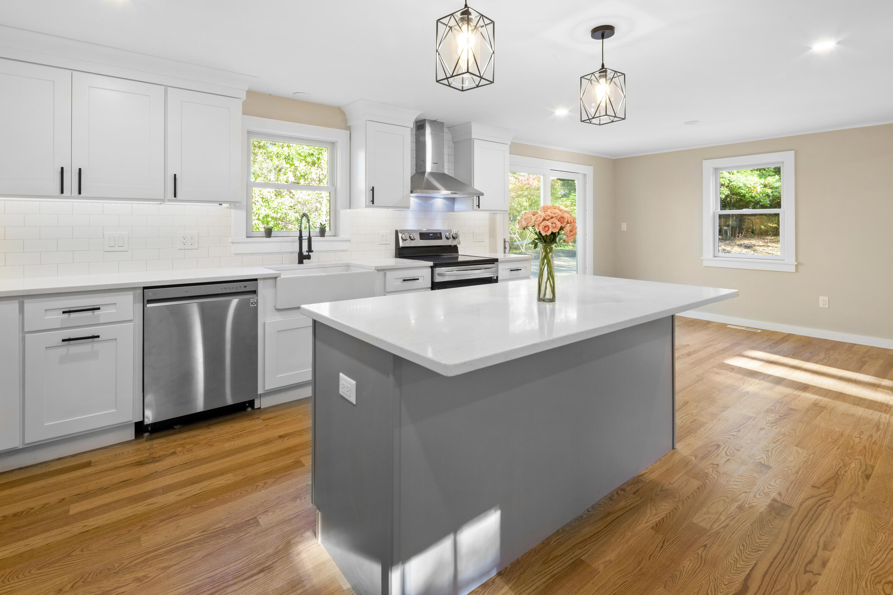 145 Stony Brook Road Brewster, MA 02631 - Photo 9 of 42 a kitchen with a sink cabinets and window