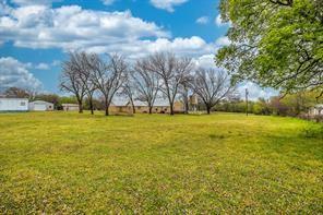 1717 Pipeline Road Cleburne, TX 76033 - Photo 16 of 26 a view of swimming pool with trees in background