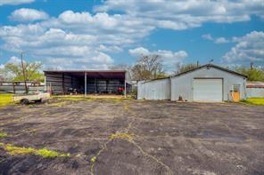 1717 Pipeline Road Cleburne, TX 76033 - Photo 20 of 26 a house view with swimming pool and yard