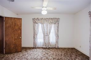 1717 Pipeline Road Cleburne, TX 76033 - Photo 10 of 26 a view of a room with window and chandelier fan