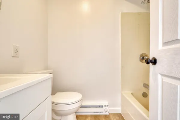 a bathroom with a sink and a toilet