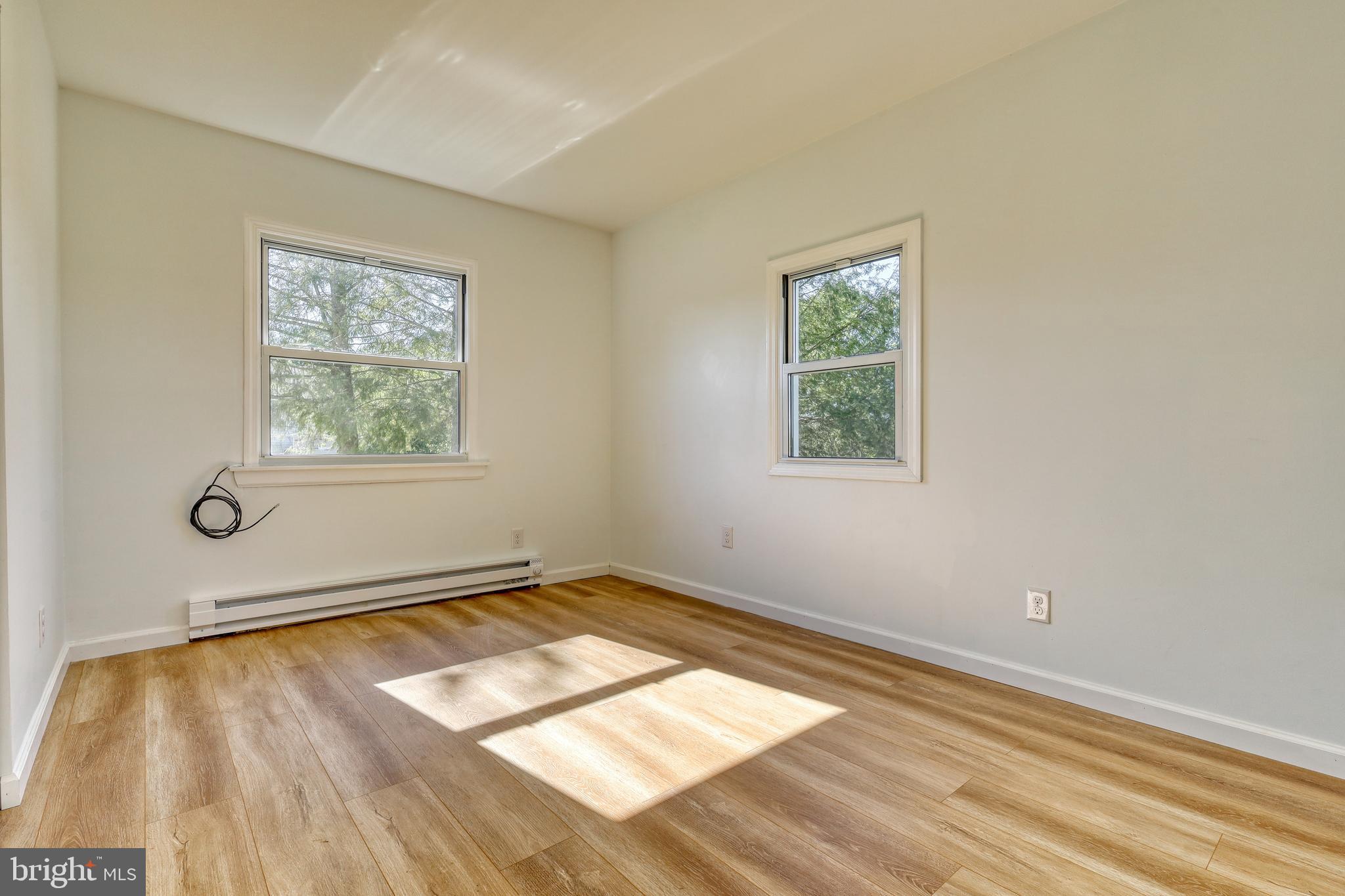 125 Ramblewood Road Pennsylvania Furnace, PA 16865 - Photo 17 of 36 an empty room with a window