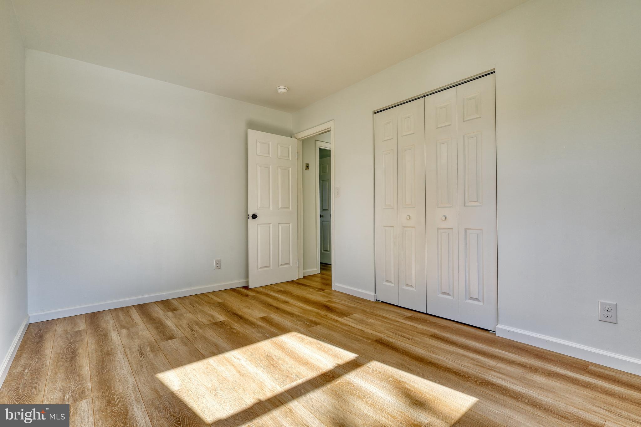 125 Ramblewood Road Pennsylvania Furnace, PA 16865 - Photo 18 of 36 a view of a room with wooden floor