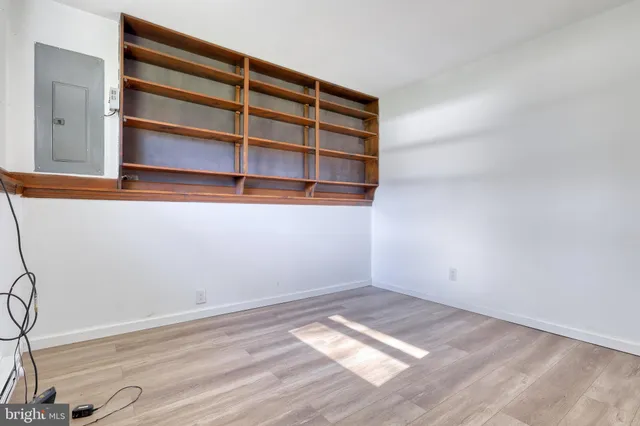 a view of a room with rack on the wall