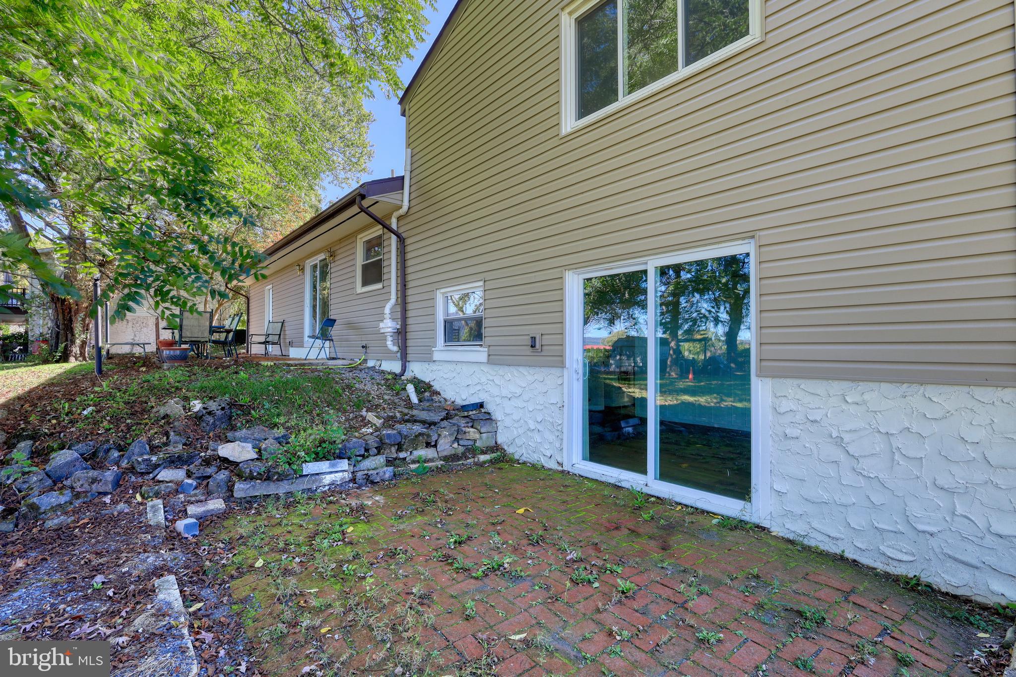 125 Ramblewood Road Pennsylvania Furnace, PA 16865 - Photo 27 of 36 a view of a house with backyard and garden