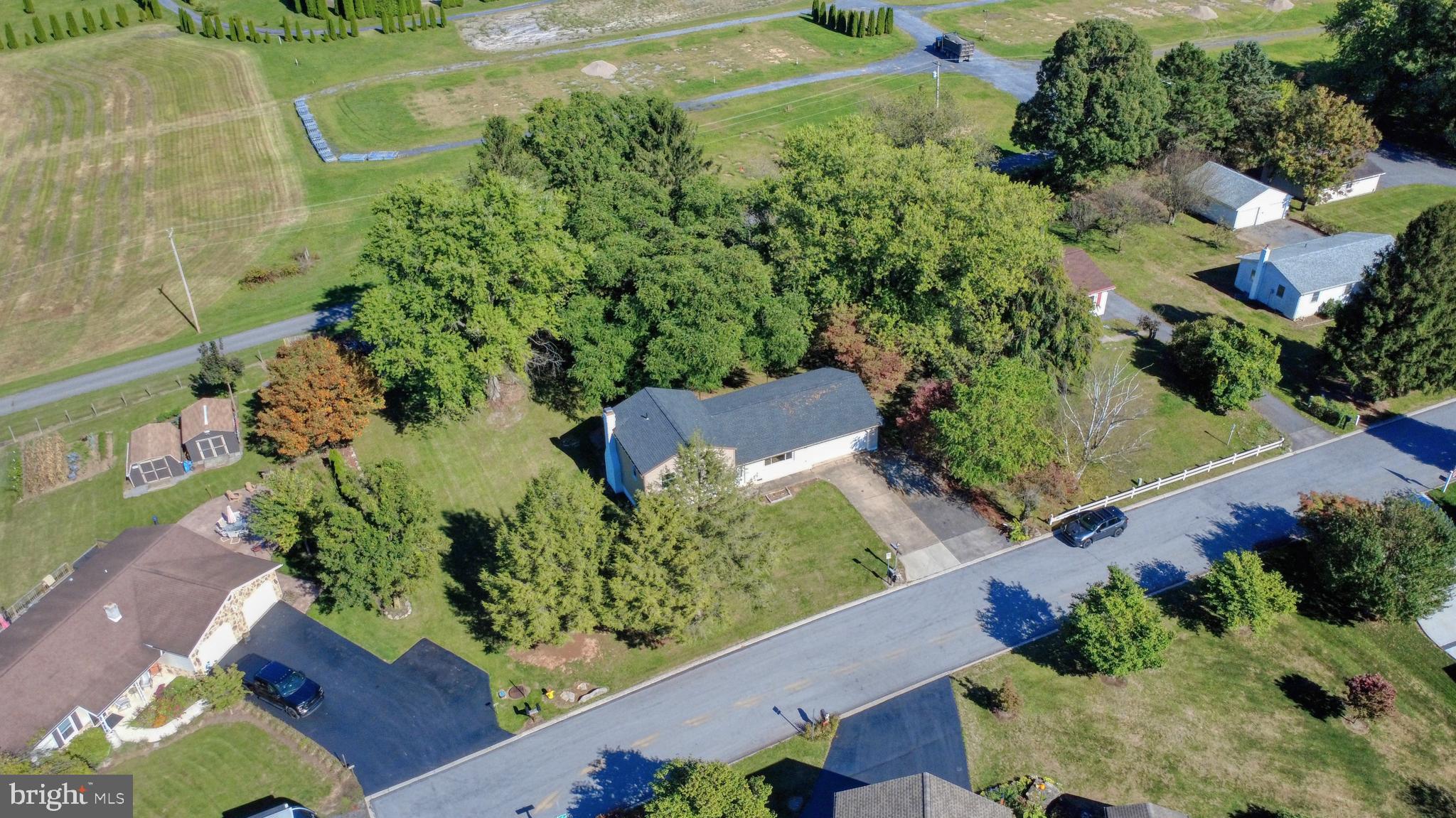 125 Ramblewood Road Pennsylvania Furnace, PA 16865 - Photo 34 of 36 an aerial view of a house