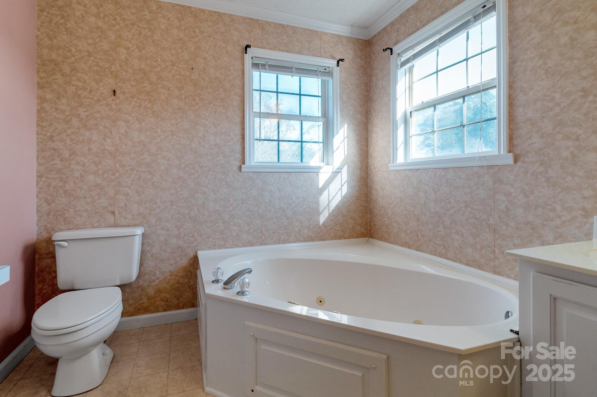 2716 Camp Creek Road Lancaster, SC 29720 - Photo 33 of 47 a white bath tub sitting next to a toilet