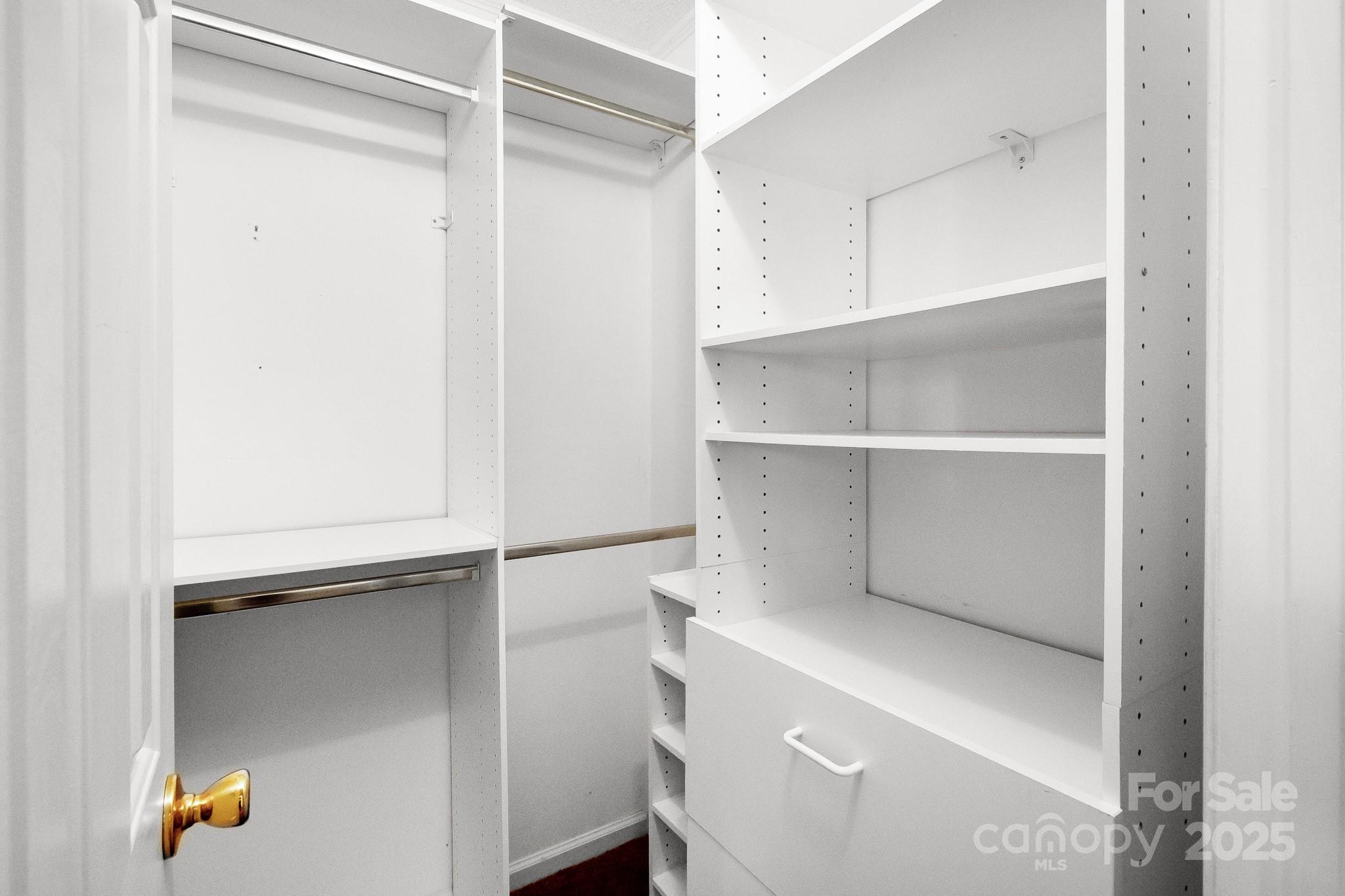 2716 Camp Creek Road Lancaster, SC 29720 - Photo 34 of 47 a room with a closet and wooden floor