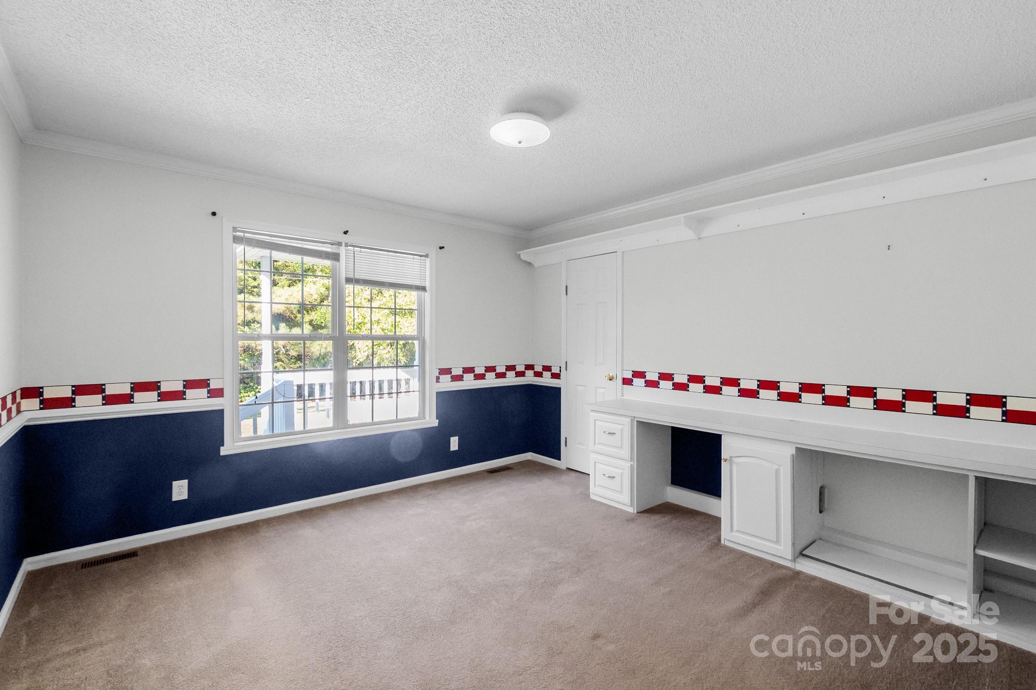 2716 Camp Creek Road Lancaster, SC 29720 - Photo 36 of 47 a room with toys and a chandelier