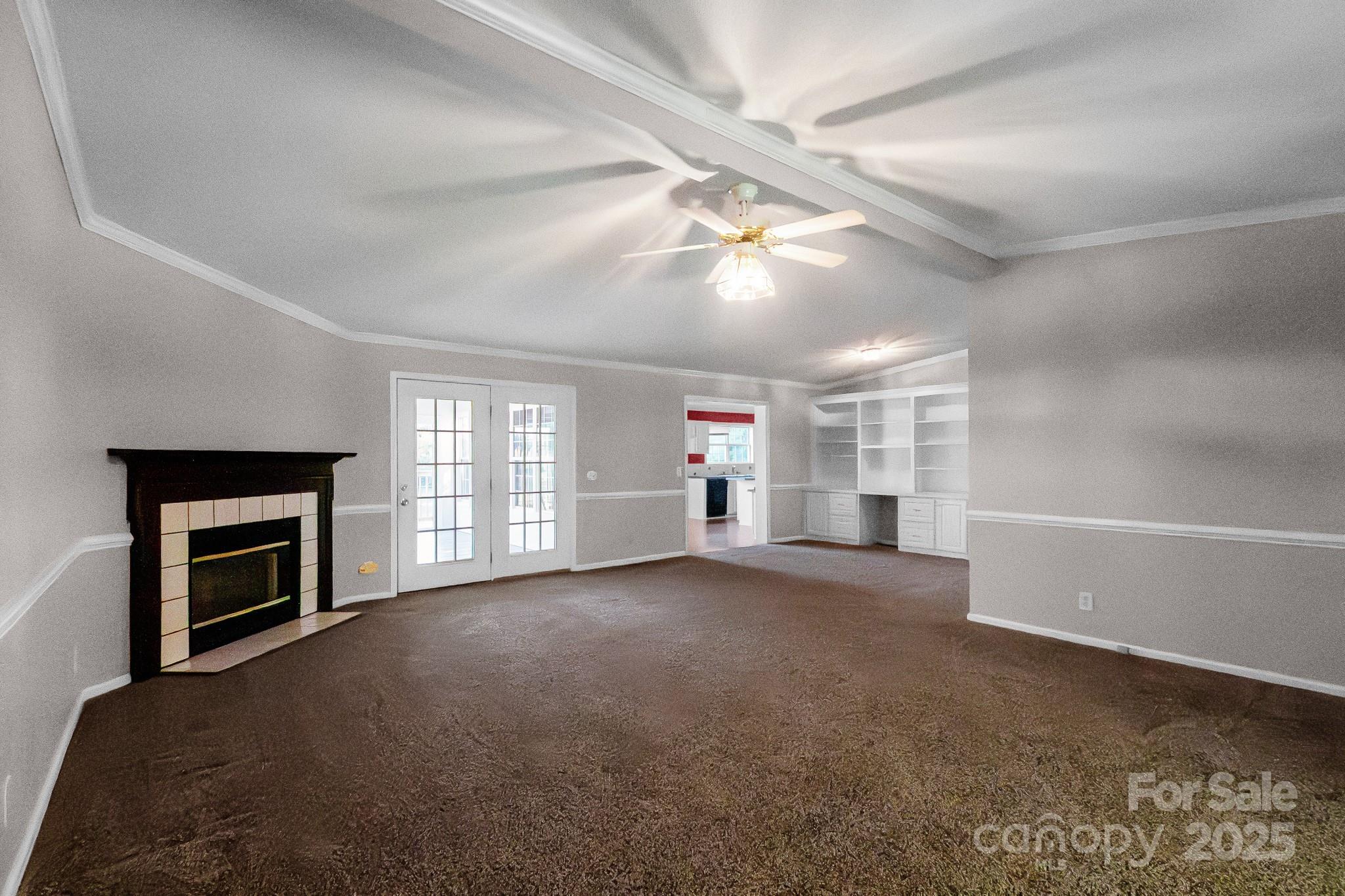 2716 Camp Creek Road Lancaster, SC 29720 - Photo 38 of 47 a view of a livingroom with an empty space and a fireplace