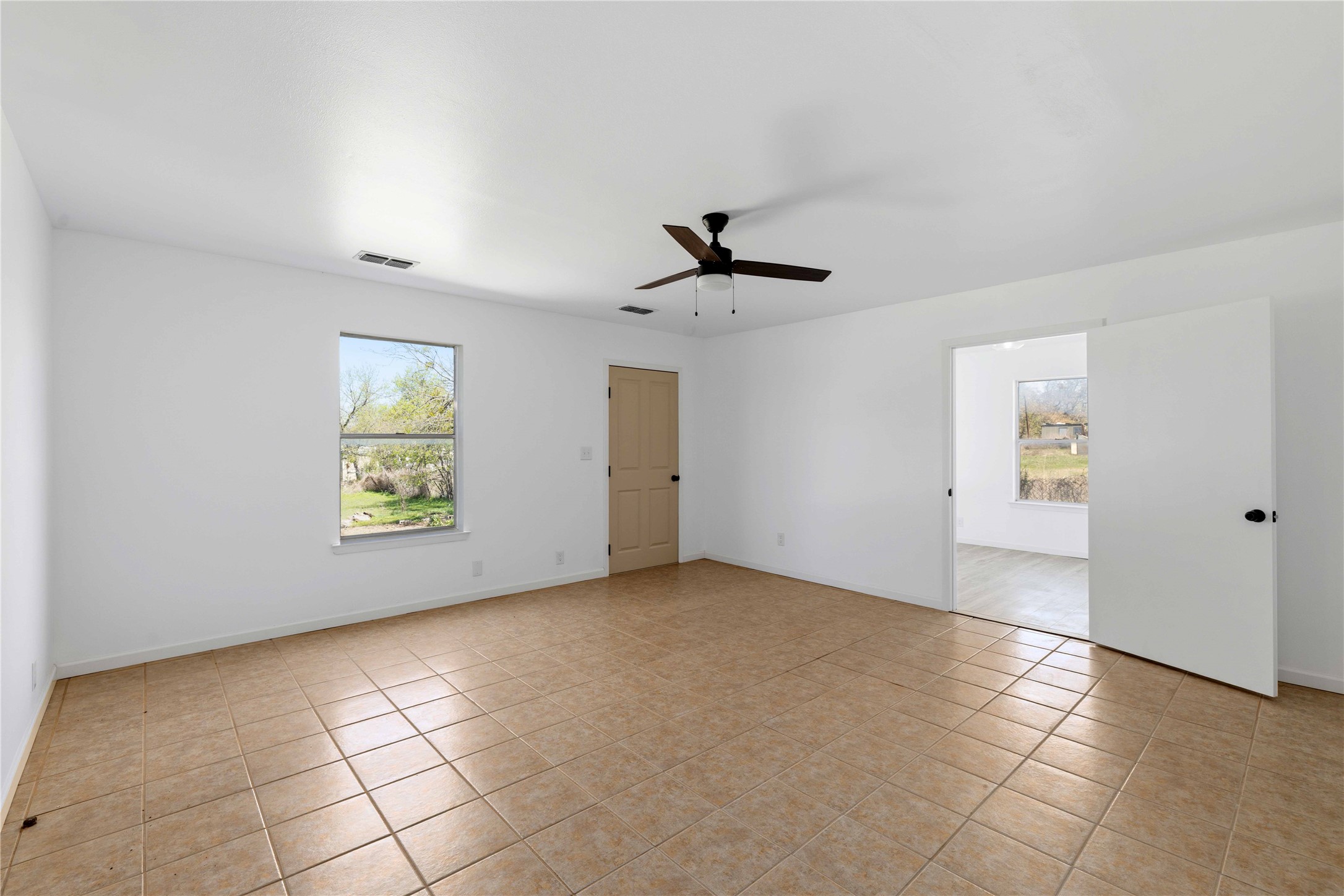 1604 5th Street Goldthwaite, TX 76844 - Photo 13 of 23 a view of an empty room with a window