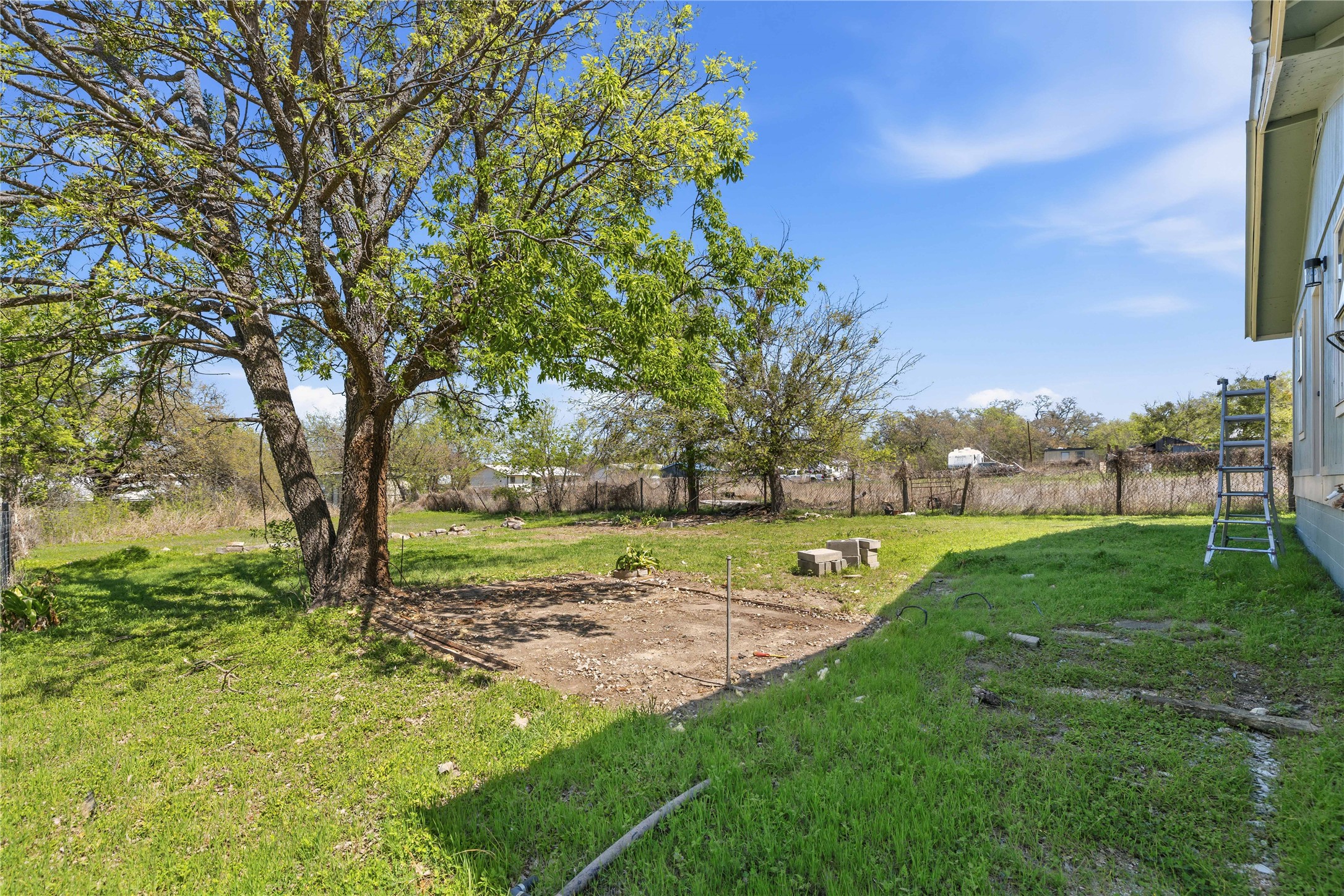1604 5th Street Goldthwaite, TX 76844 - Photo 4 of 23 a view of a trees with a yard