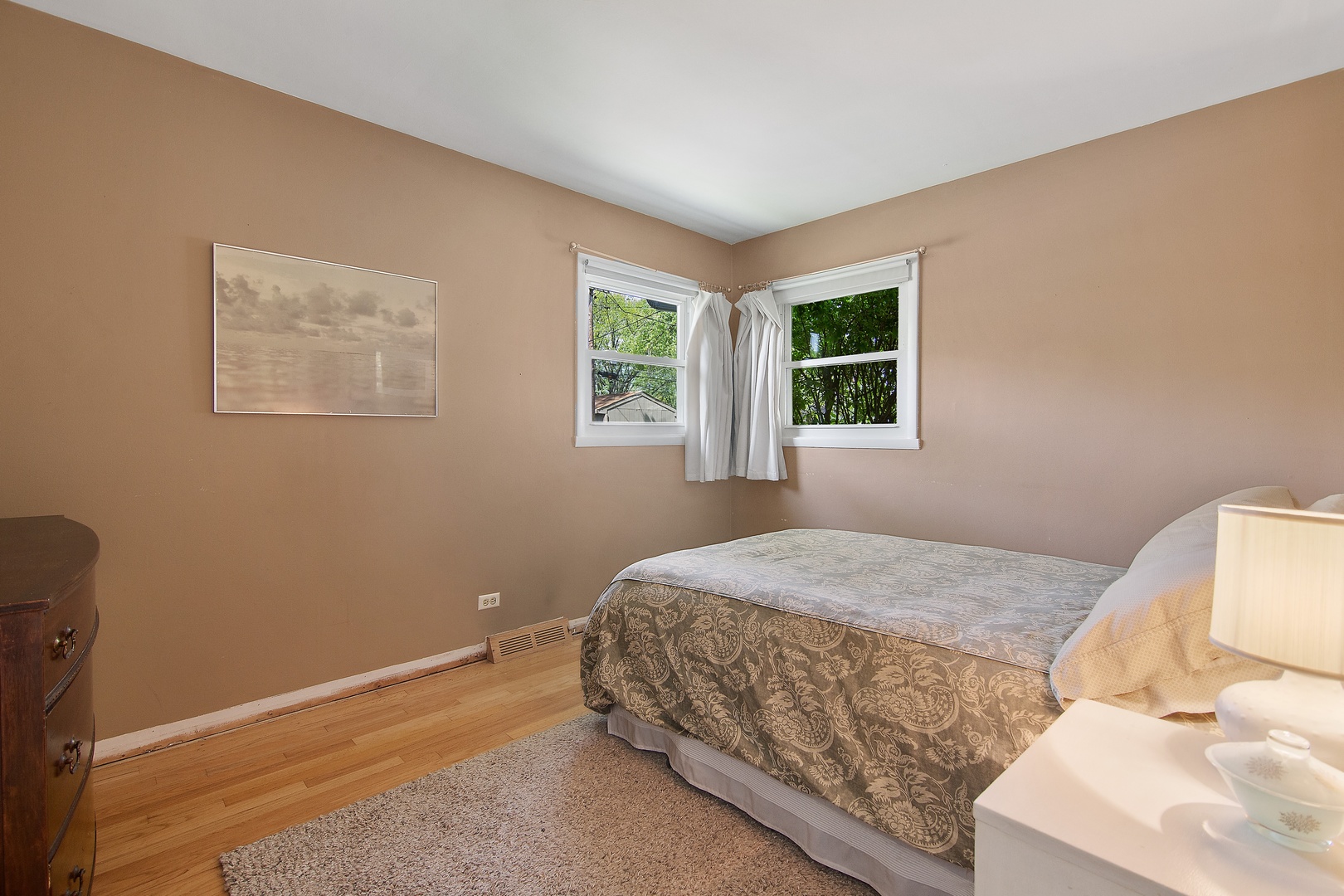 936 Pebble Drive Wheeling, IL 60090 - Photo 15 of 27 a bedroom with a bed and window