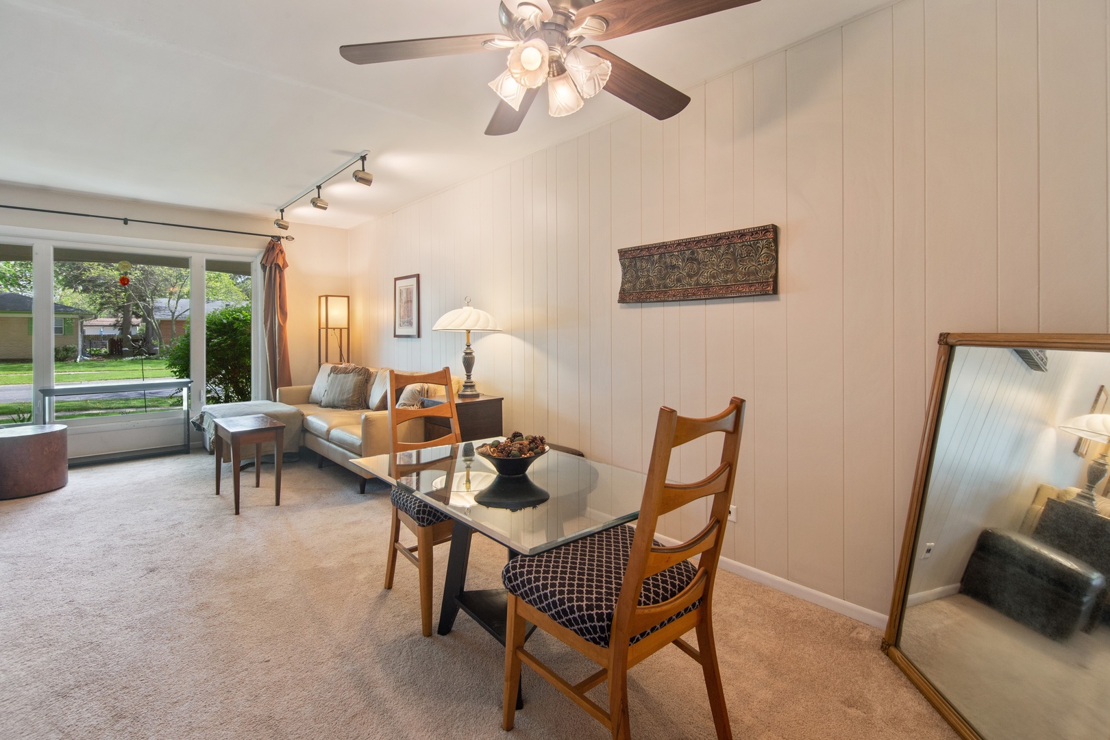 936 Pebble Drive Wheeling, IL 60090 - Photo 7 of 27 a living room with furniture and a floor to ceiling window