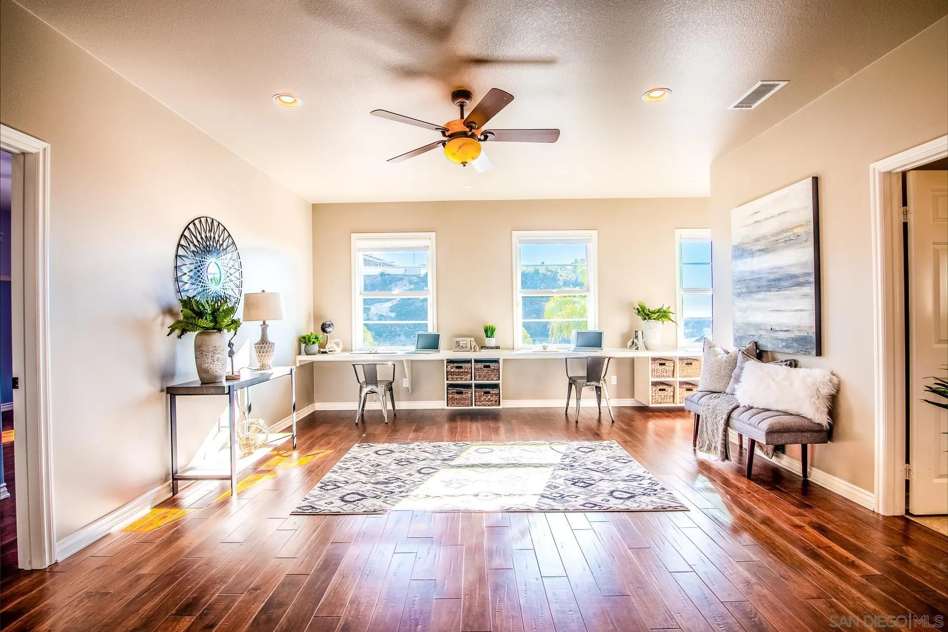 1219 Vista De Lomas Bonsall, CA 92003 - Photo 18 of 47 a living room with furniture and a wooden floor