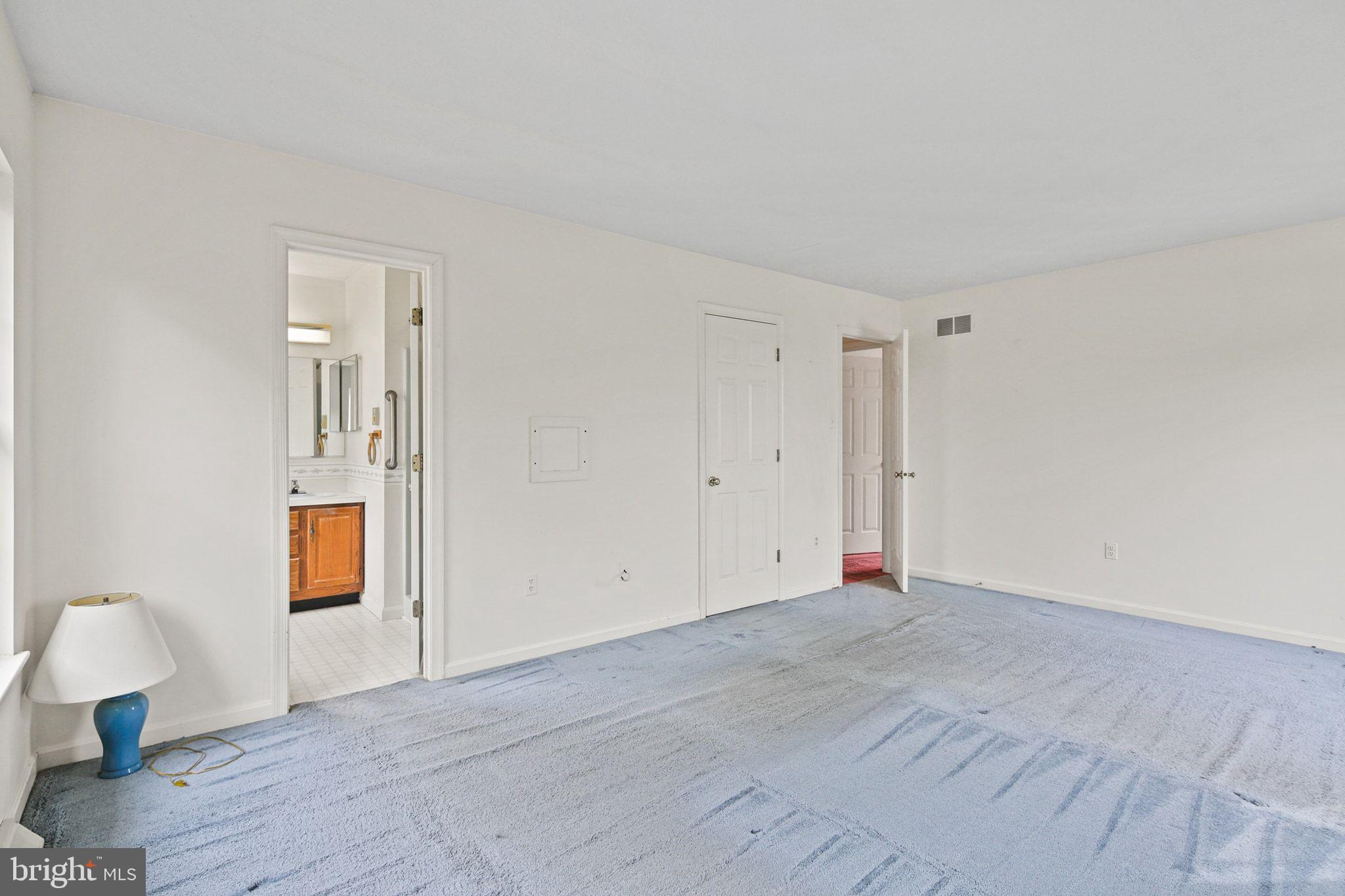61 Marhill Court Westminster, MD 21158 - Photo 22 of 33 a view of an empty room with wooden floor and a window