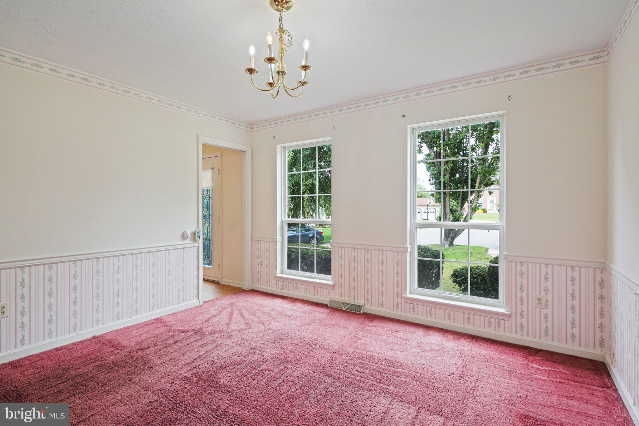 61 Marhill Court Westminster, MD 21158 - Photo 3 of 33 a view of a livingroom with a window and wooden floor