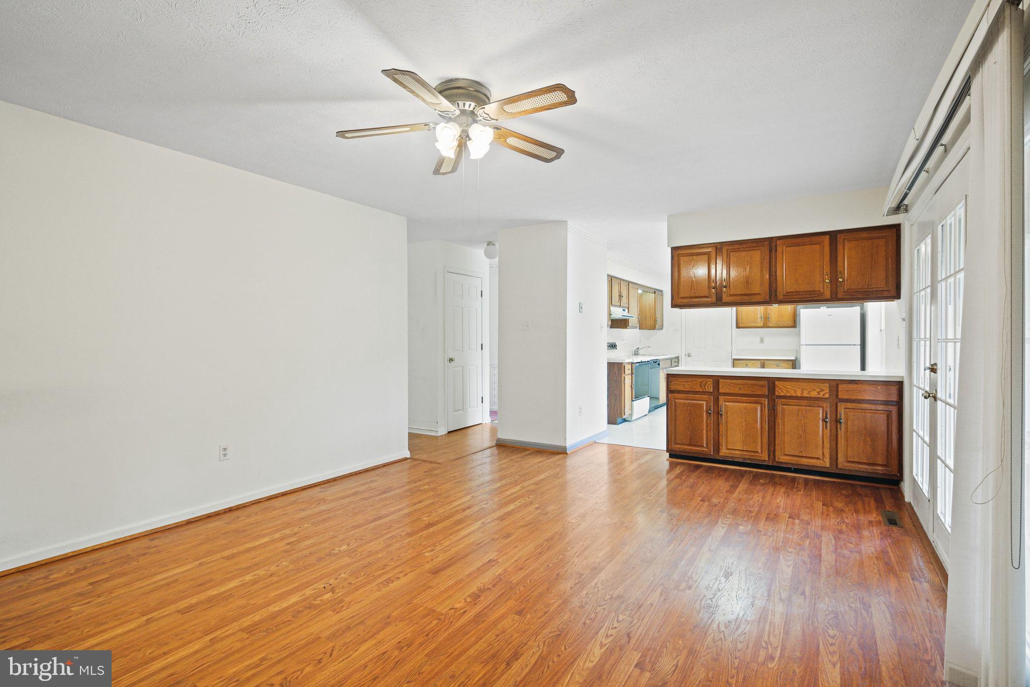 61 Marhill Court Westminster, MD 21158 - Photo 9 of 33 a view of kitchen with sink and wooden floor