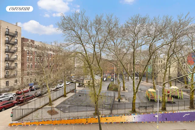 a bedroom with a bed and a chair