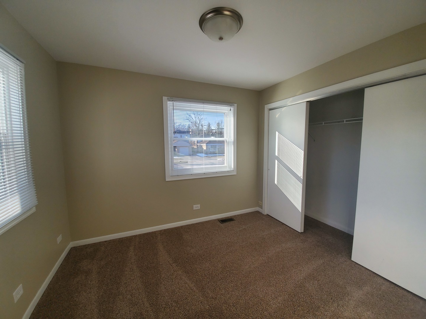 1695 Clavey Road Highland Park, IL 60035 - Photo 14 of 24 an empty room with windows
