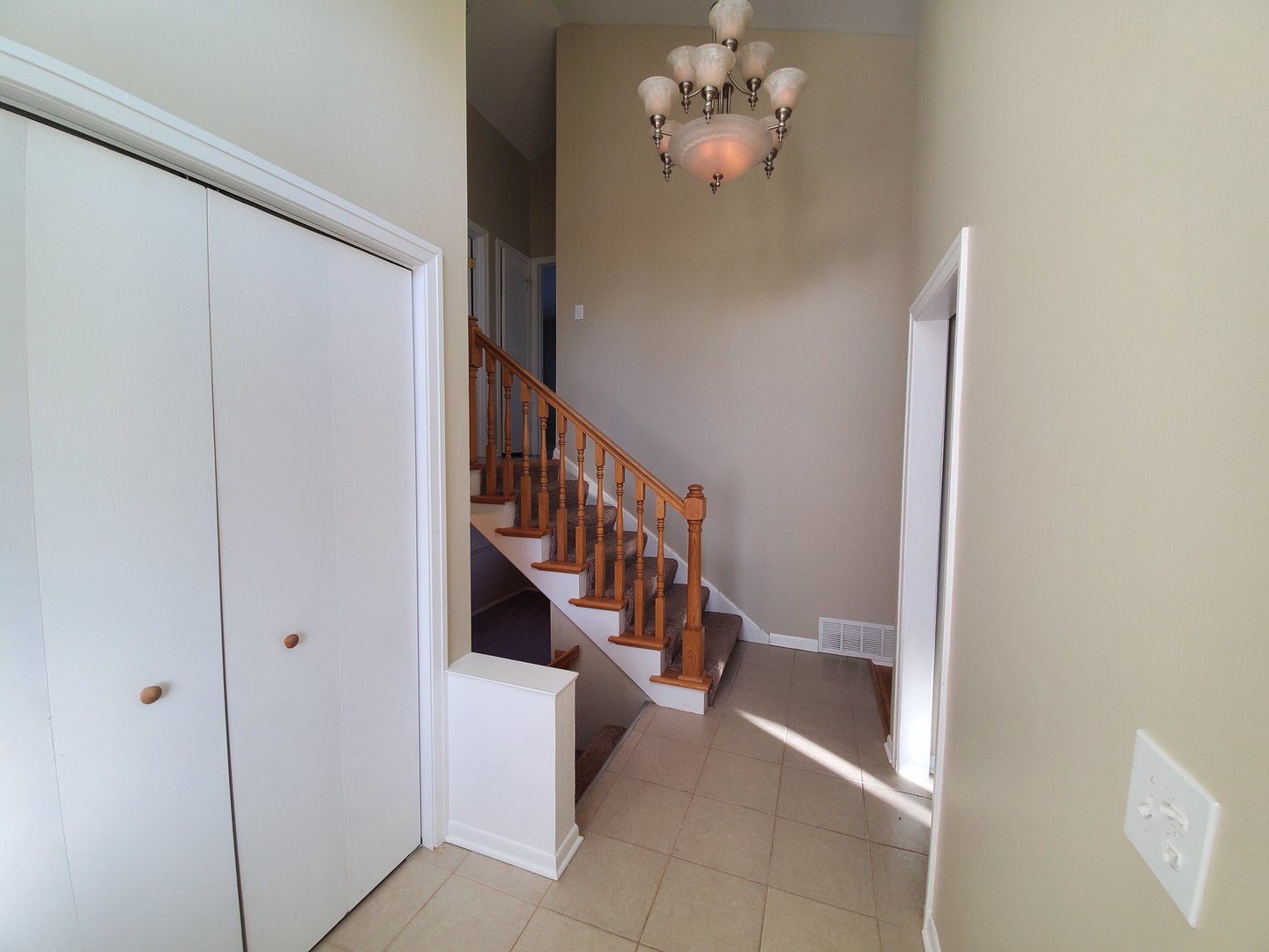 1695 Clavey Road Highland Park, IL 60035 - Photo 3 of 24 a view of entryway and hall with a window