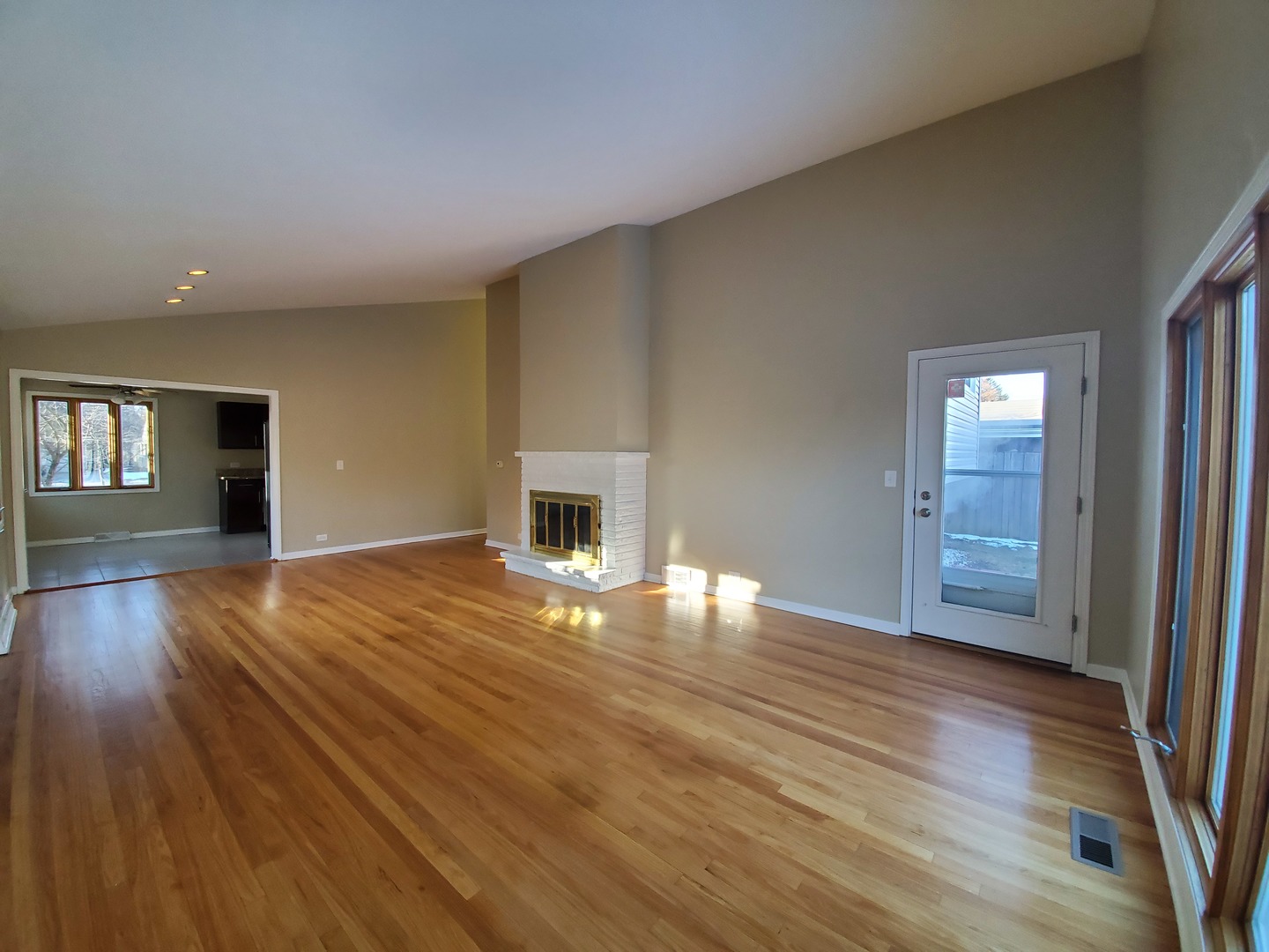 1695 Clavey Road Highland Park, IL 60035 - Photo 6 of 24 wooden floor in an empty room with a window