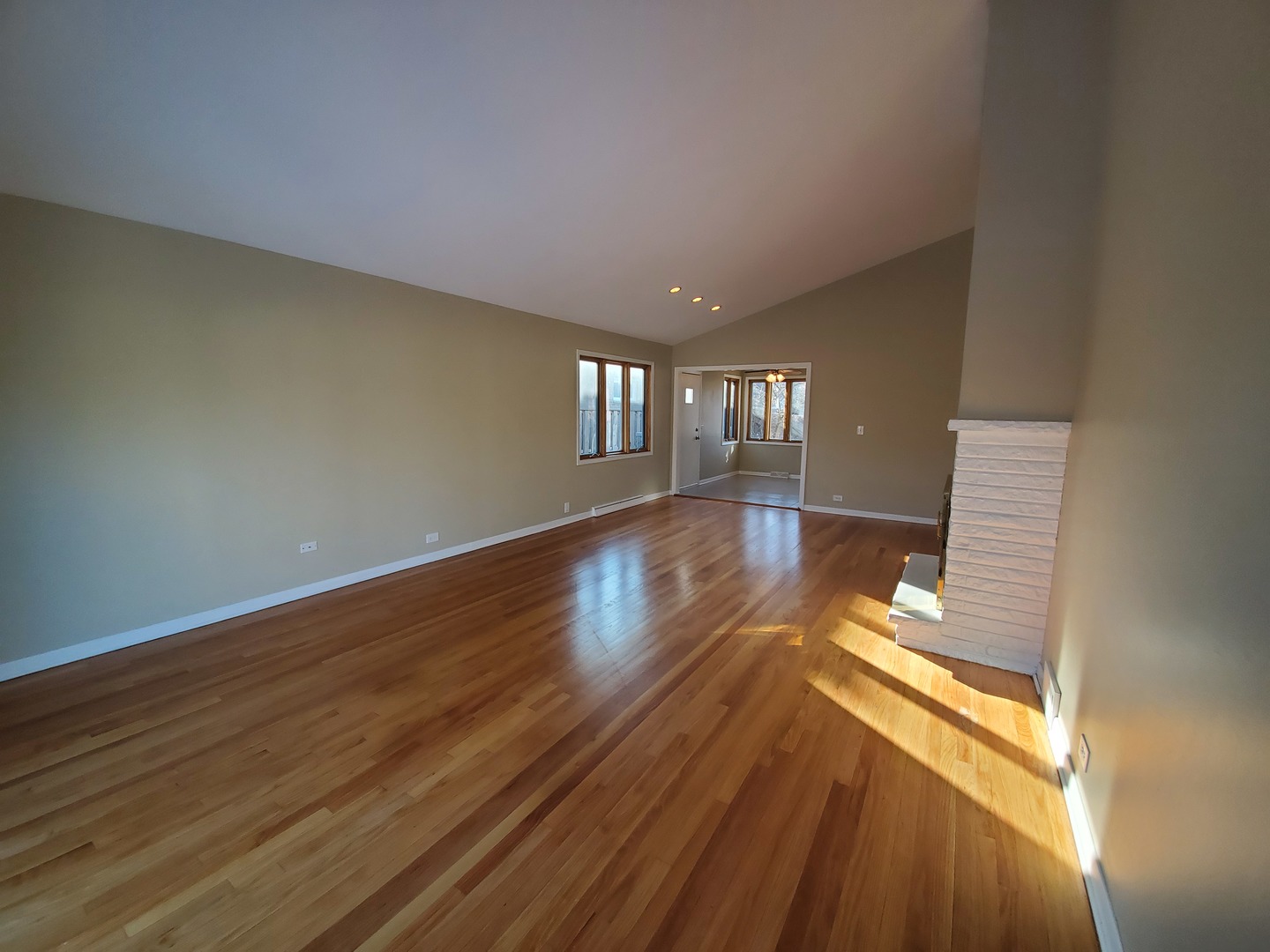 1695 Clavey Road Highland Park, IL 60035 - Photo 7 of 24 a view of an empty room with wooden floor