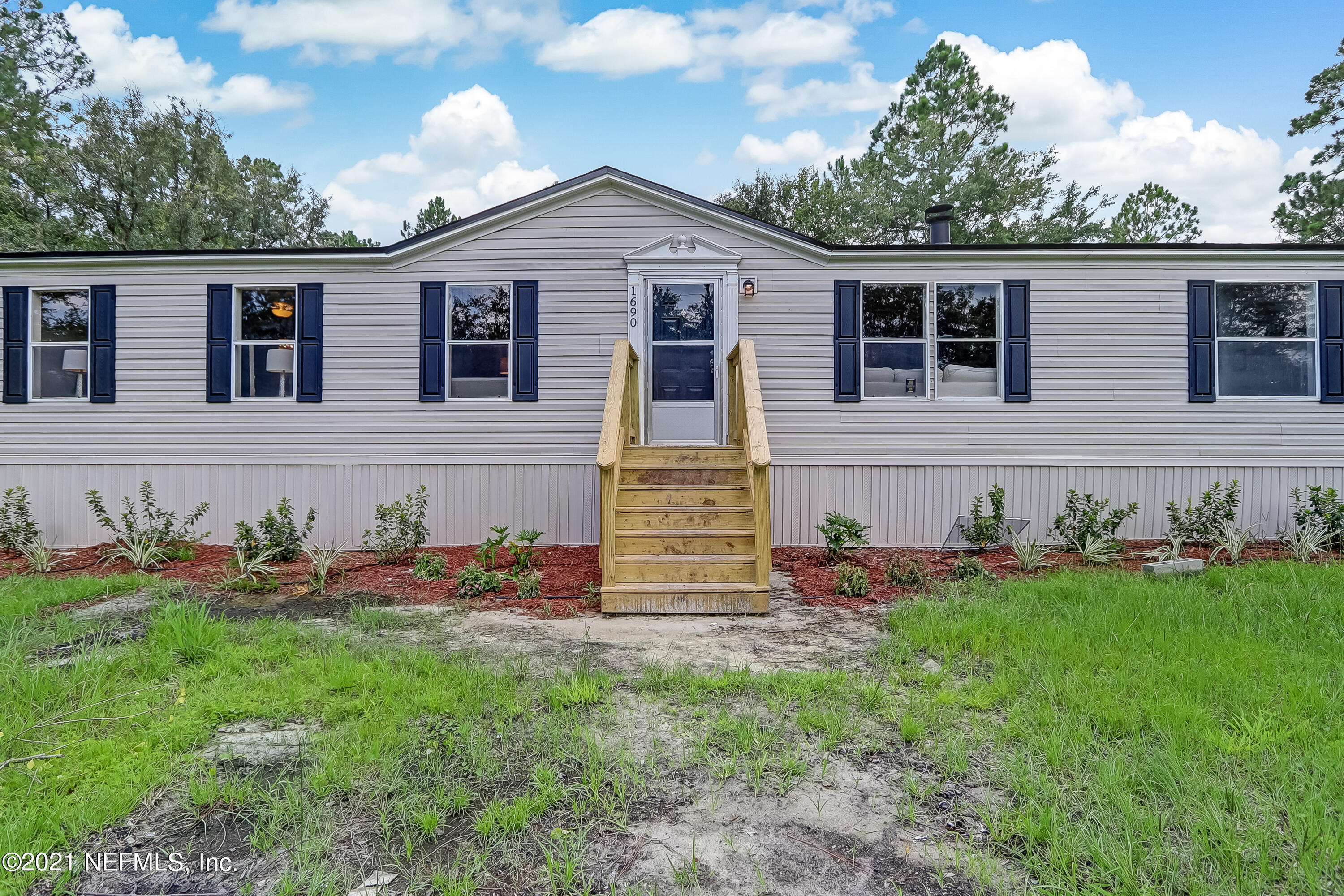 1690 Nolan Road Middleburg, FL 32068 - Photo 2 of 35 IMG_0505_06_07_08_09_10_11