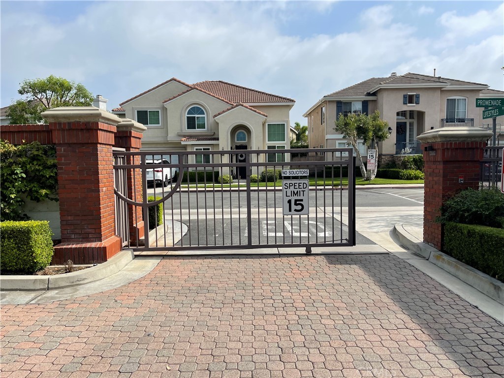3095 Promenade Costa Mesa, CA 92626 - Photo 2 of 10 a front view of a house with balcony