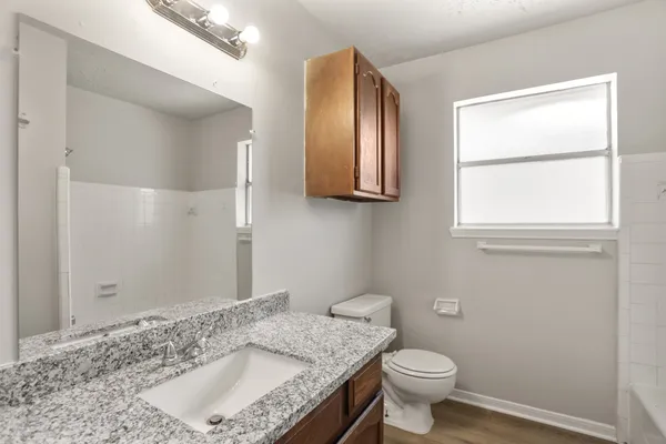 a bathroom with a sink and a toilet