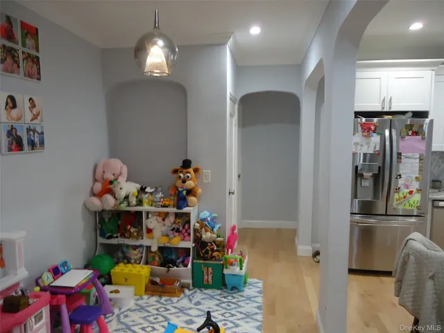 a room with toys and wooden floor