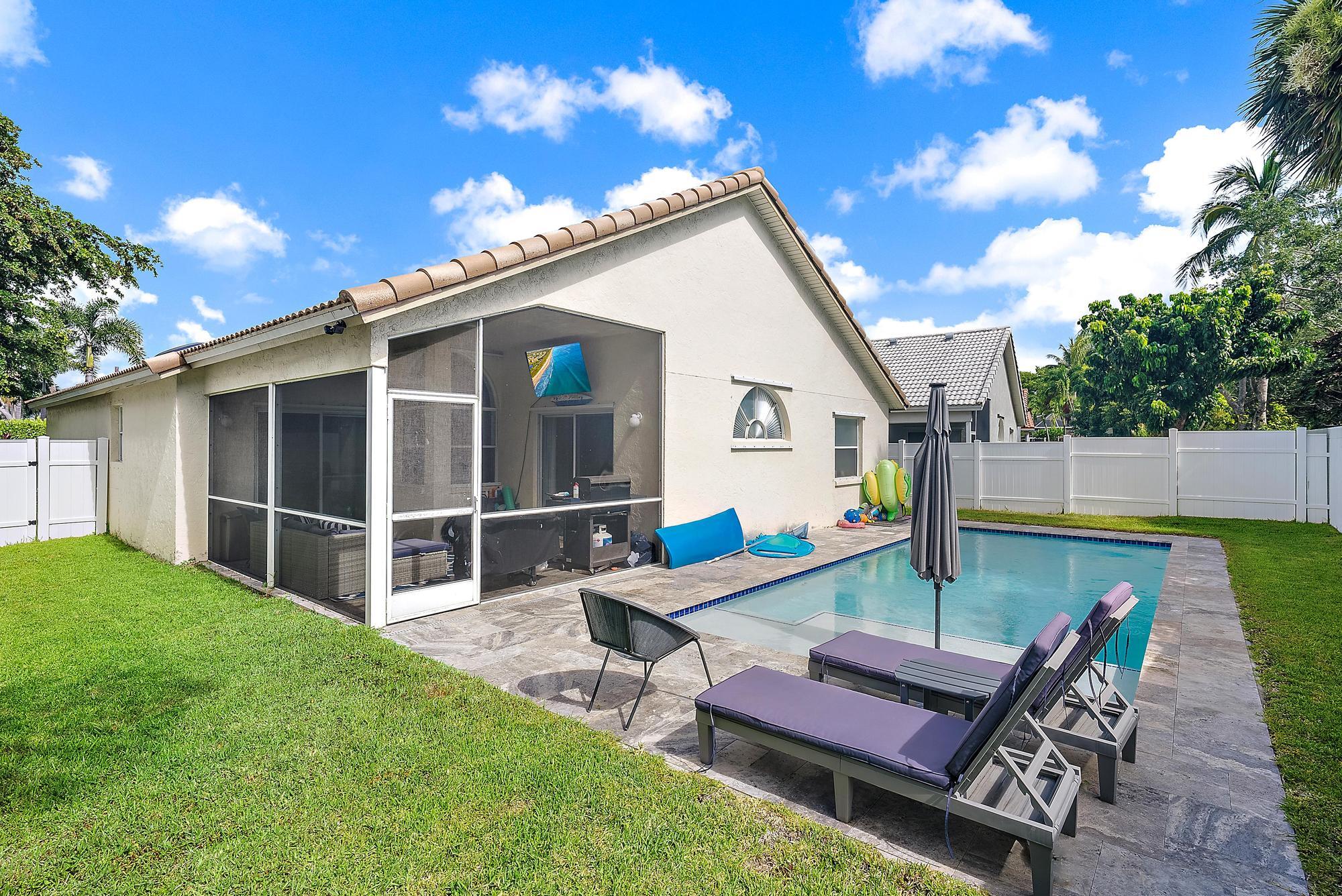 159 St Michaels Court Jupiter, FL 33458 - Photo 3 of 22 a view of outdoor space yard and patio