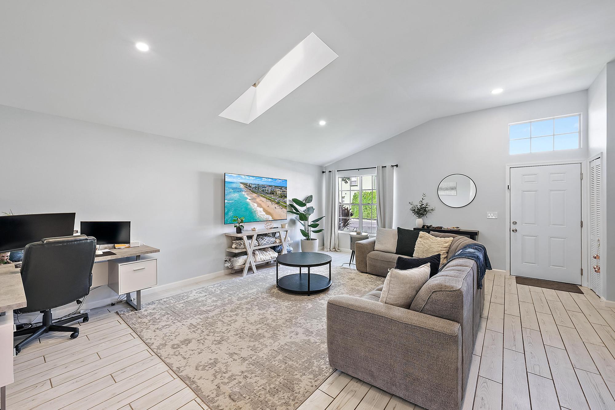 159 St Michaels Court Jupiter, FL 33458 - Photo 9 of 22 a living room with furniture