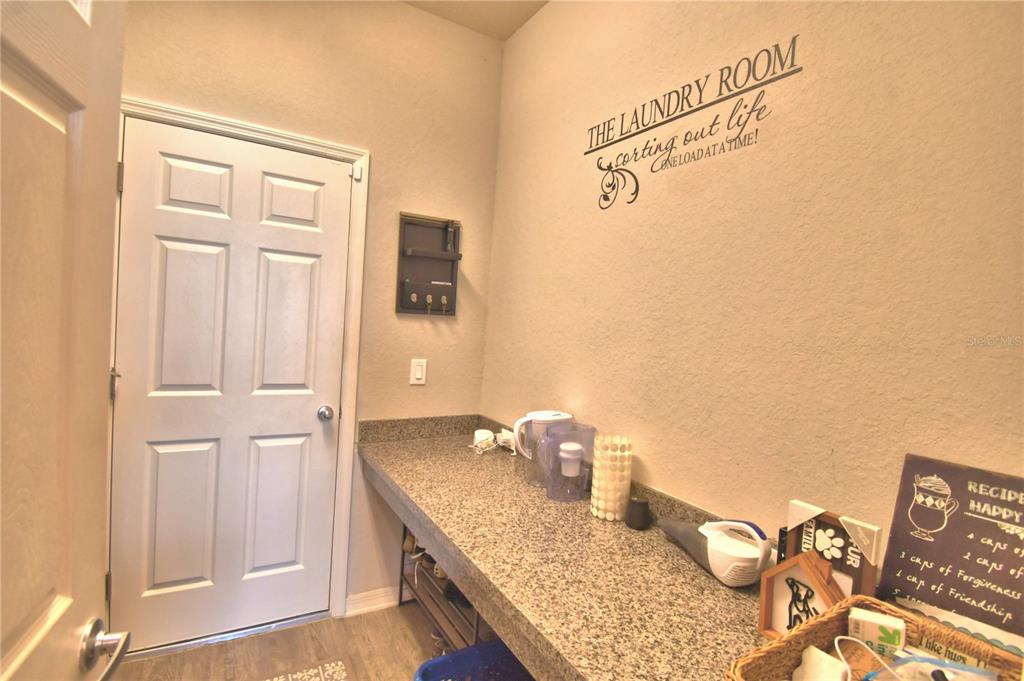 4340 Reding Way Lakeland, FL 33813 - Photo 40 of 63 a bathroom with a granite countertop sink and a mirror