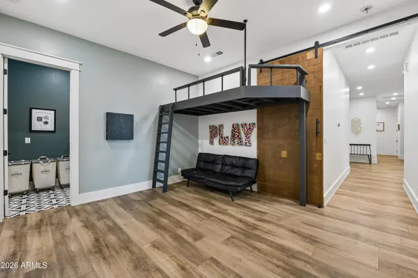 a view of a swimming pool with a yard