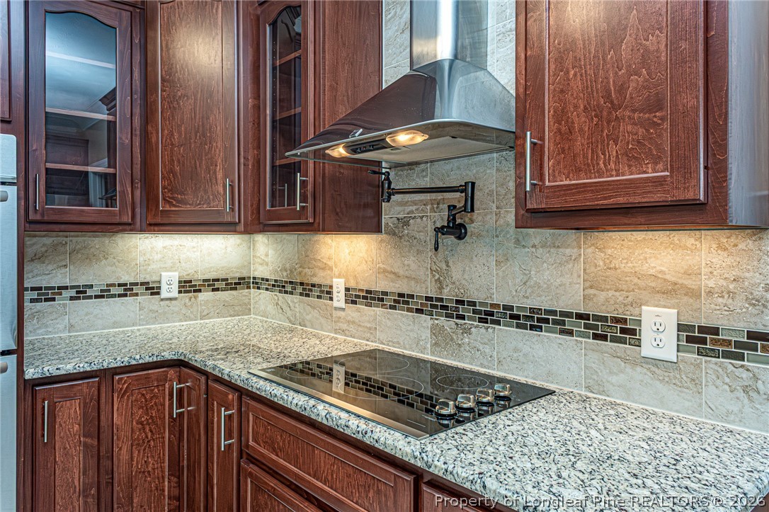 126 West 12 Oaks Road Raeford, NC 28376 - Photo 17 of 49 Cooktop, Vent Hood and Pot Filler
