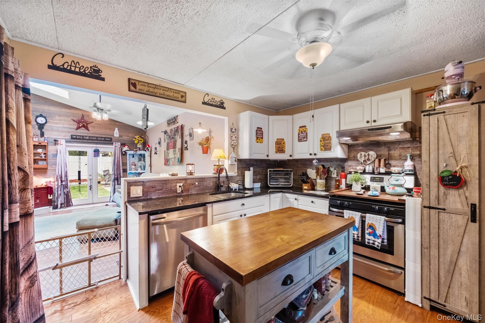 17 Perry Road Cornwall, NY 12518 - Photo 11 of 38 a kitchen with stainless steel appliances granite countertop a stove and a refrigerator