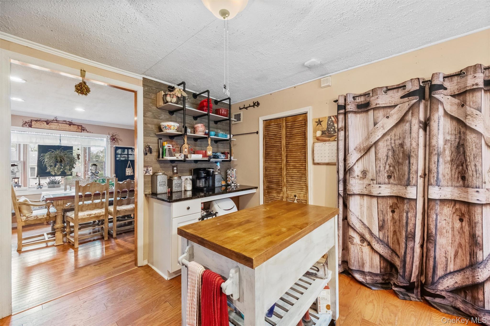 17 Perry Road Cornwall, NY 12518 - Photo 13 of 38 a kitchen that has a lot of cabinets in it and wooden floor
