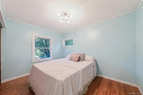 an aerial view of a houses with a yard