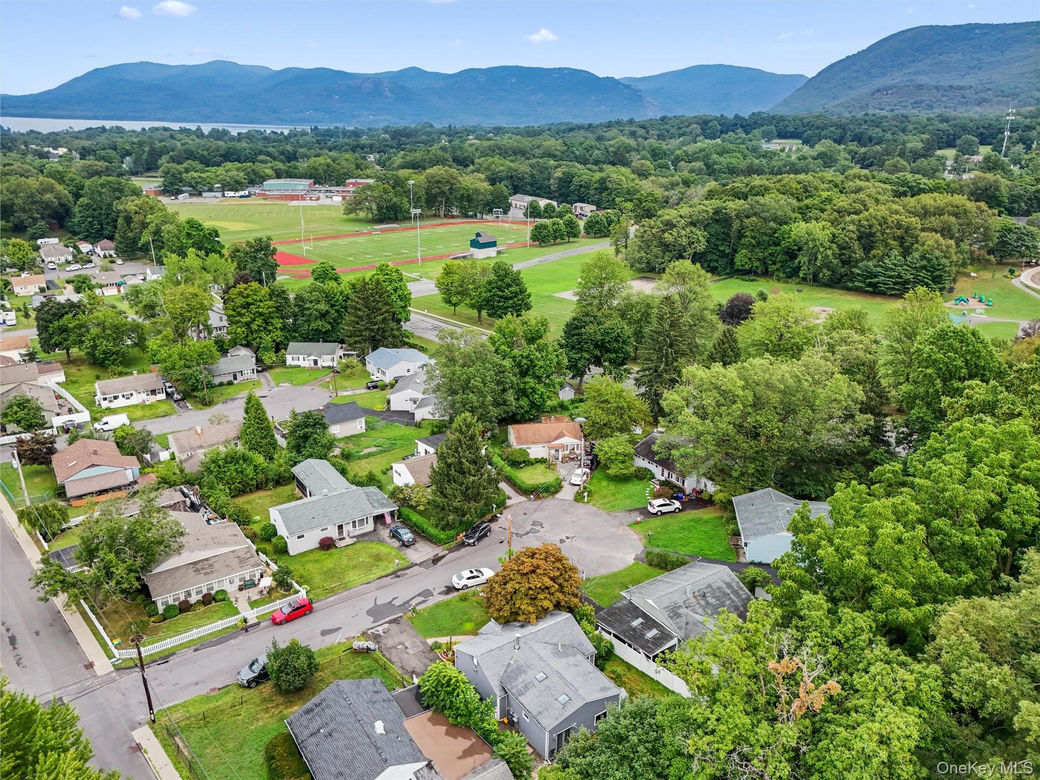 17 Perry Road Cornwall, NY 12518 - Photo 34 of 38 an aerial view of green landscape with trees houses and mountain view