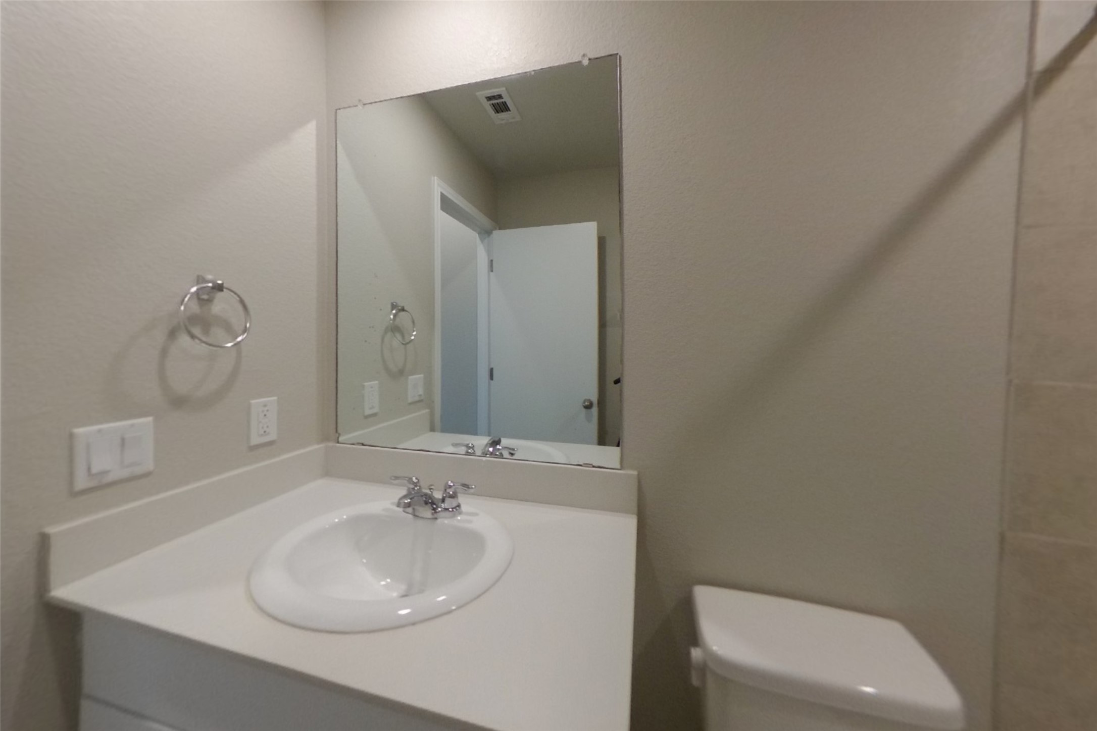 3525 Catlett Crk Road Georgetown, TX 78626 - Photo 12 of 16 A clean vanity area offers a neutral color palette with simple plumbing fixtures.
