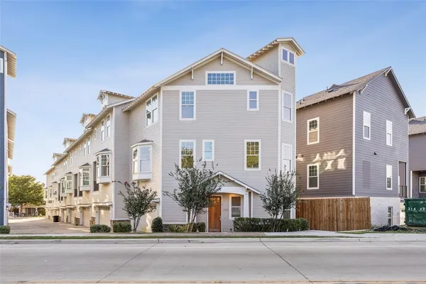 a front view of a large white building