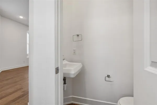 a bathroom with a sink and mirror