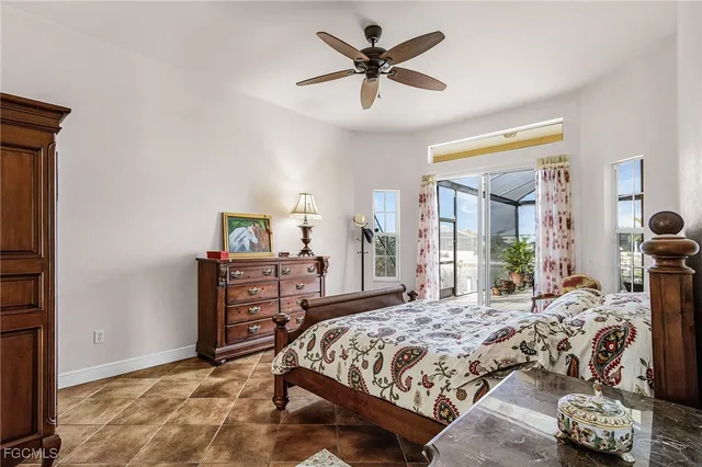 a bedroom with a bed and a table in it