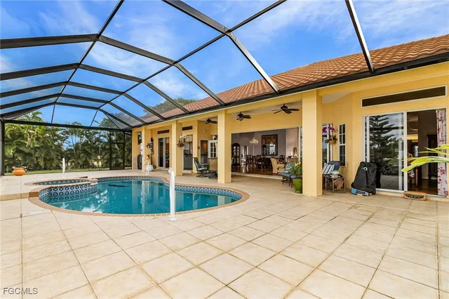a view of indoor pool and sitting area